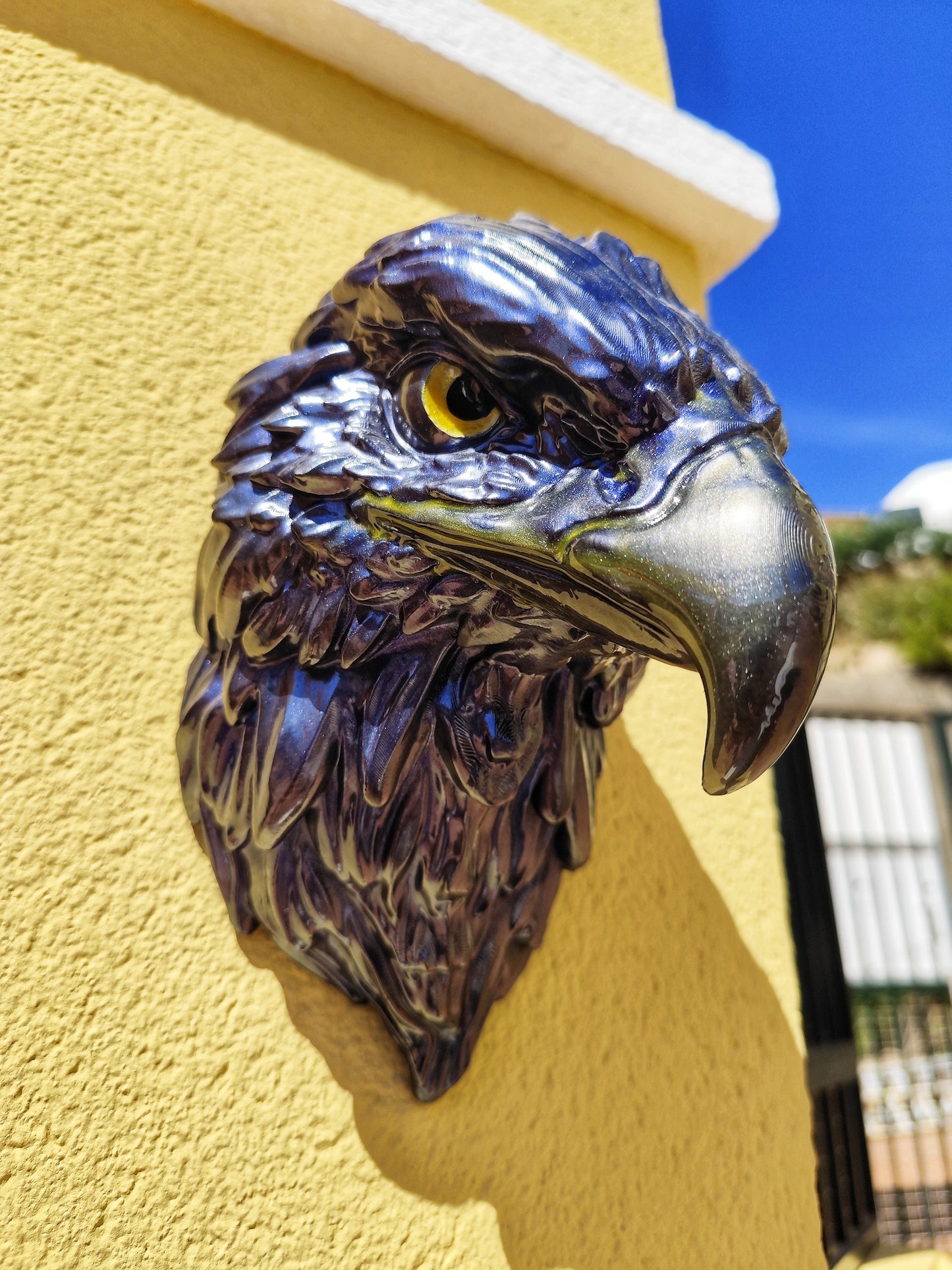 Blue metallic eagle head wall sculpture, nature-inspired decor