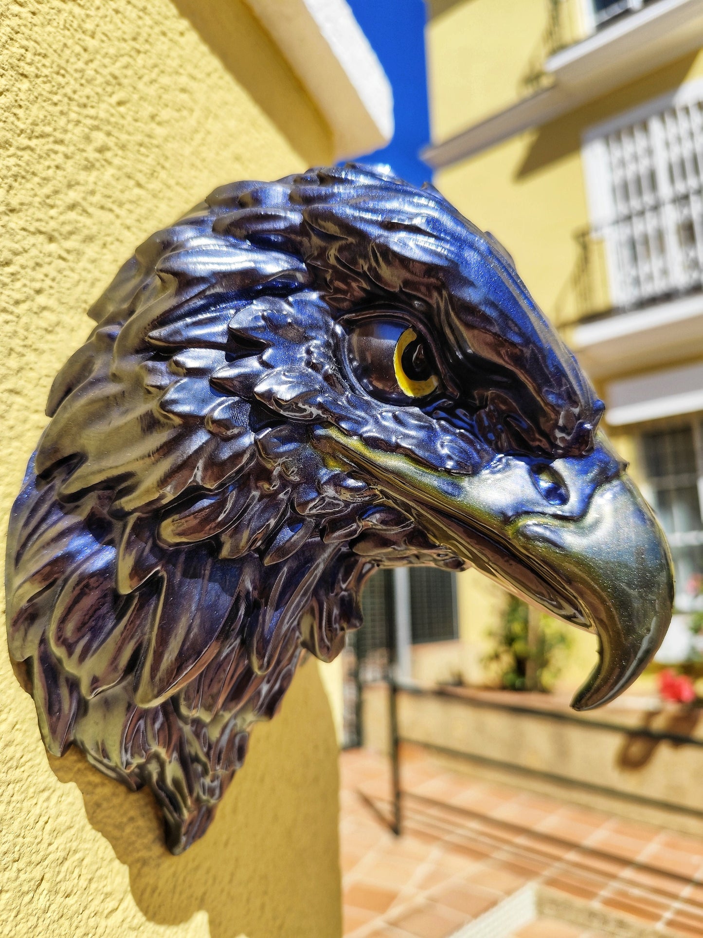 Eagle wall hanging with striking metallic blue finish